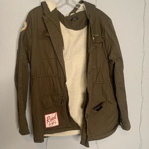Navy green jacket w/ patches